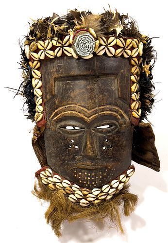 AFRICAN CARVED WOOD, COWRY SHELL, WOVEN, FEATHER, AND METAL KUBA HEADDRESS, H 12", W 10"