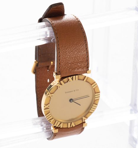 TIFFANY & CO. 14K GOLD LADIES WRISTWATCH WITH BROWN LEATHER BAND, L 8.75", T.W. 38 GR 