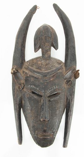 SENUFO KPELIE, IVORY COAST, AFRICAN POLYCHROME CARVED WOOD MASK WITH METAL AND FIBER, 20TH CENTURY H 17" W 8" 