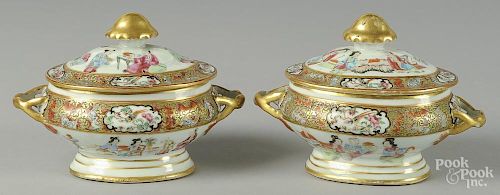 Pair of Chinese export porcelain famille rose sauce tureens, 19th c., 5 1/2'' h., 8'' w.