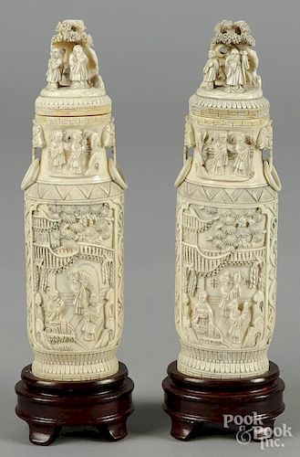 Pair of Chinese carved ivory urns, early 20th c., 8 1/2'' h.