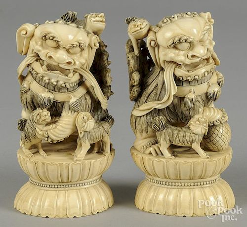 Pair of Chinese carved ivory foo lions, late 19th c., 6 3/4'' h.