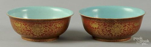 Pair of Chinese porcelain bowls, together with a bronze mirror, 2'' h., 5'' dia. and 5 1/4'' dia.