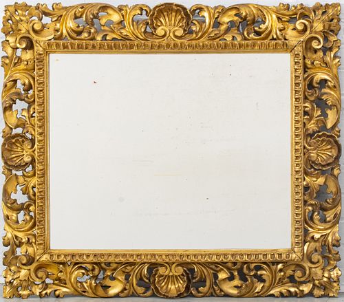 FLORENTINE ANTIQUE GOLD LEAF, CARVED GILTWOOD AND GESSO MIRROR 19TH CENTURY, H 34", L 40"