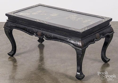 Chinese black lacquer folding table, early 20th c., with a mother of pearl inlay