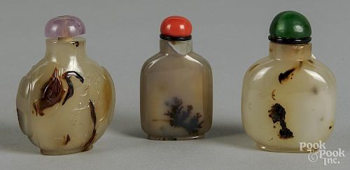 Three Chinese silhouette agate snuff bottles.