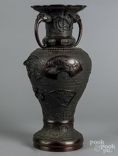 Japanese bronze urn, ca. 1900, with intricate bird and floral design, 24'' h.