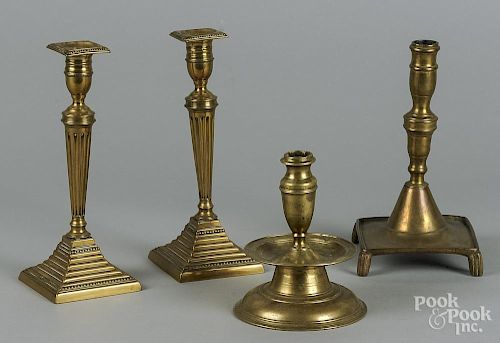 Four assorted brass candlesticks, 17th/18th c., tallest - 10''.