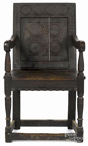 Jacobean carved oak wainscot armchair, ca. 1700.