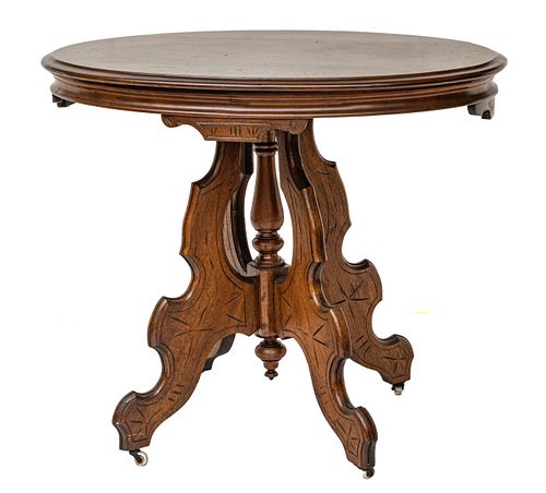 VICTORIAN CARVED WALNUT OVAL TOP TABLE, H 29.5", W 23.5", L 34.5" 