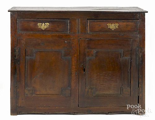 English oak paneled cupboard, early/mid 18th c., 38 1/2'' h., 49'' w.