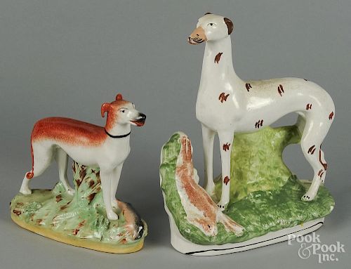 Two Staffordshire whippet and hare groups, 7'' h. and 10 1/4'' h.