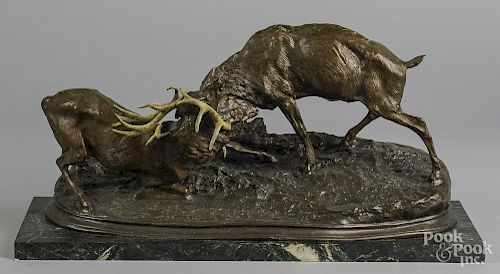 After P. J. Mene, patinated bronze of two stags, 10'' h., 20'' w.