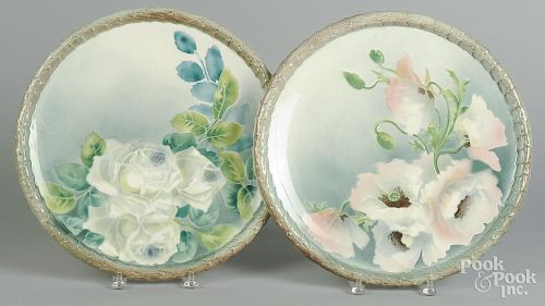 Pair of French Luneville pottery chargers, with floral decoration, 16 1/2'' dia.