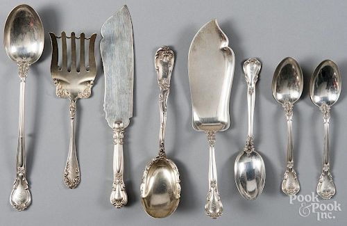 Eight sterling silver serving utensils, 28.3 ozt.