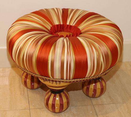 MACKENZIE-CHILDS (AMERICAN) UPHOLSTERED STRIPE OTTOMAN WITH HAND PAINTED CERAMIC FEET, H 15", DIA 21" 