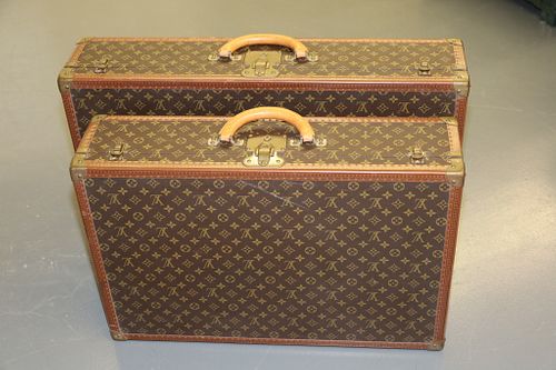LOUIS VUITTON (FRENCH, EST. 1854), LEATHER,  TWO SIZES OF SUITCASE, H 18.5"-20.5", W 6.75"-7", L 27.75"-31.75" 