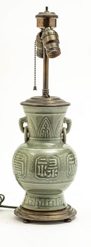 CHINESE GREEN CELADON ELECTRIFIED TABLE PORCELAIN LAMP, SIGNED AT THE SIDES W./ A GEOMETRIC DESIGN (1) H 19" DIA 6" O/A SIZE AT BASE. 