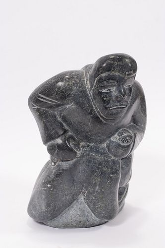 INUIT STONE SCULPTURE OF A HUNTER, H 14", W 9"