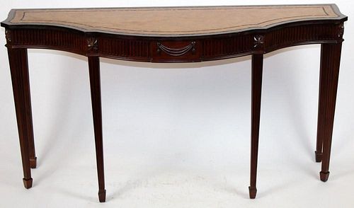 Maitland Smith mahogany console with leather top.