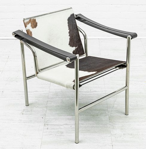 IN THE STYLE OF LE CORBUSIER FOR CASSINA ITALIAN COW HIDE CHAIR WITH CHROME FRAME H 27" W 24" D 24" 