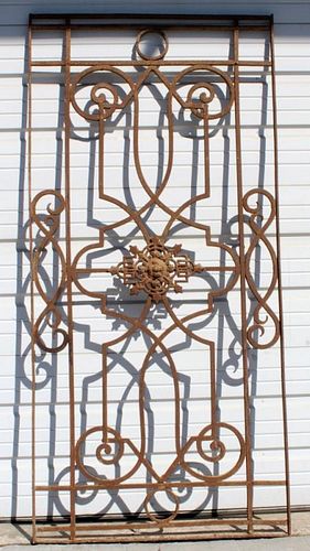 Antique iron gate with center crest