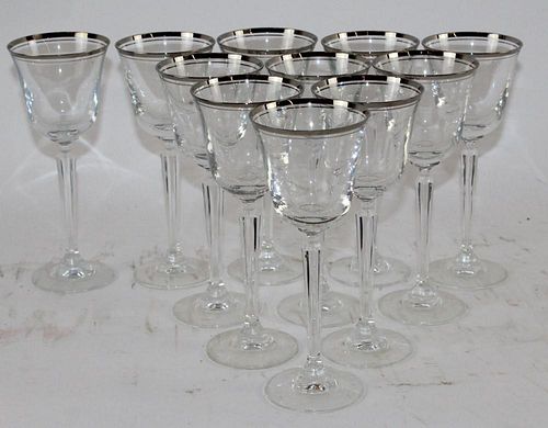 Set of 11 crystal wine glasses with silver rim