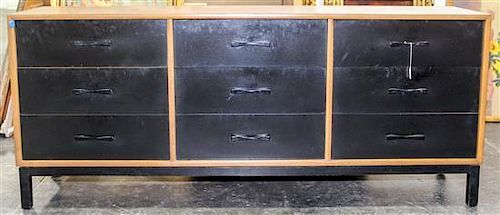 A Mid-Century Chest of Drawers. Height 30 1/2 x width 71 1/4 x depth 17 3/4 inches.