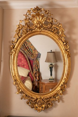 FRENCH LOUIS XVI STYLE OVAL GILT GESSO OVER WOOD MIRROR, MID 20TH C., H 51", W 31" 