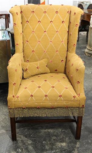 * A George III Style Mahogany Wingback Chair. Height of chair 45 1/2 inches.