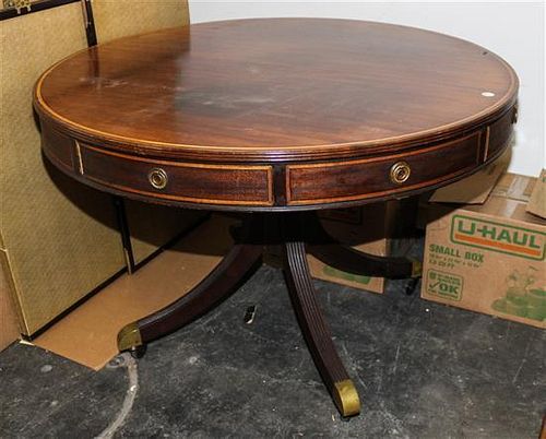 * A George III Style Mahogany Drum Table Height 30 1/2 x diameter 45 inches.