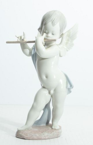 LLADRO (SPANISH, B. 1953), PORCELAIN, H 10" CUPID/ANGEL PLAYING THE FLUTE 
