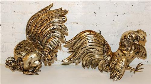 A Pair of Silvered Metal Fighting Roosters. Width of larger 24 inches.