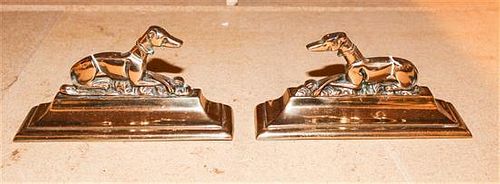 * A Pair of Brass Figural Bookends. Width 9 1/4 inches.