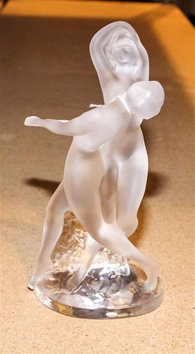 * A Lalique Molded and Frosted Glass Figural Group. Height 10 1/8 inches.