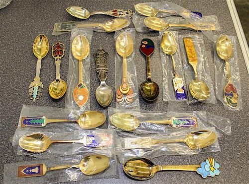 A Group of Eighteen Danish Silver, Gilt and Enamel Christmas Spoons, various makers, comprising examples from: 1923, 1928, 19