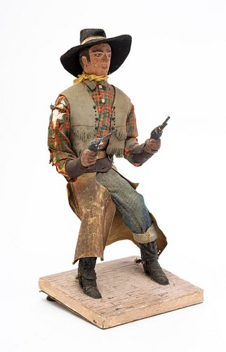 COWBOY DOLL WITH DRAWN REVOLVERS CLOTH, METAL, WOOD & LEATHER 1900S (1) H 17" W 8" 