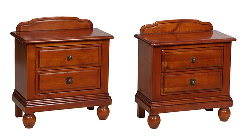Pair of French Louis Philippe Style Carved Cherry Nightstands, 20th c., the arched fielded panel splashboards over a bank of fielded panel drawers on 