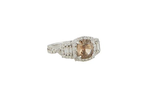 Lady's 18K White Gold Dinner Ring, with a center 1.52 ct. fancy brown cushion cut diamond, atop a conforming border of tiny round diamonds flanked by 