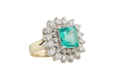14K Yellow Gold Dinner Ring, with a 2.90 Ct. Emerald, atop a double graduated border of round diamonds, total diamond wt.- app. 1.8 cts, Size 8 1/4.