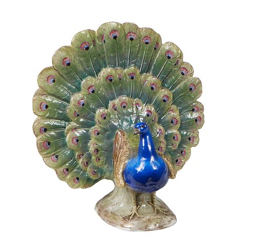 Meissen Porcelain Peacock, early 20th c., the bottom with a blue crossed swords mark, incised 276, H.- 9 1/4 W.- 9 in., D.- 4 1/2 in.