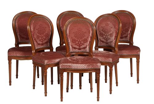 Set of Six Louis XVI Style Carved Cherry Dining Chairs, 20th c., the canted curved upholstered medallion back over a trapezoidal bowed seat, on turned