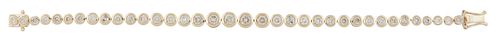 14K Yellow Gold Tennis Bracelet, by Oscar Friedman, each of the thirty-six links with a graduated round diamond, total diamond wt.- 5.52 cts., L.- 7 i