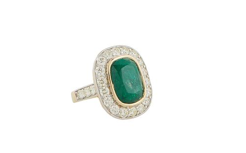 Lady's 18K Dinner Ring, with a cushion cut 6.58 ct. emerald, atop a wide border of round diamonds, the shoulders of the band mounted with round diamon