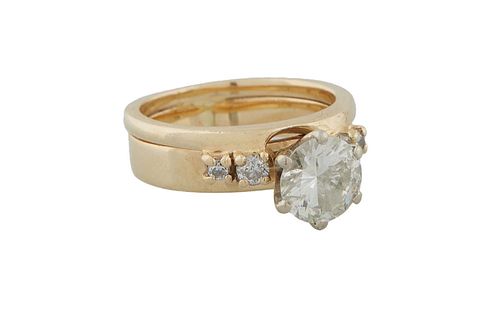 14K Yellow Gold Diamond Solitaire Ring, with a 1.75 carat round center diamond, flanked by two small graduated round diamonds, on a raised edge band, 