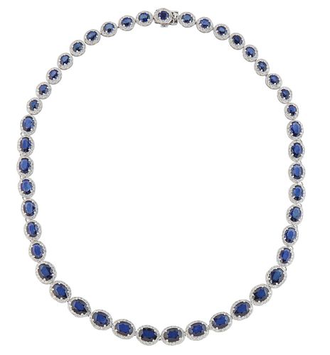 14K White Gold Link Necklace, each of the forty-five oval links with a graduated oval blue sapphire, atop a border of tiny round diamonds, total sapph