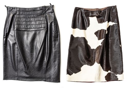 TWO KNEE LENGTH SKIRTS, GROUP OF TWO, BLACK LEATHER AND COW HIDE 