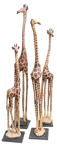 KENYAN CARVED AND HAND PAINTED WOOD GIRAFFES GROUP OF FOUR H 54.5-77" 
