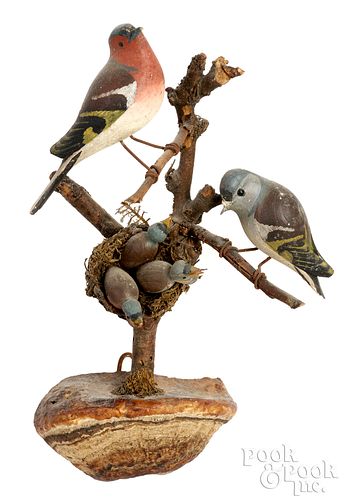 Carved and painted bird nest group, late 19th c.