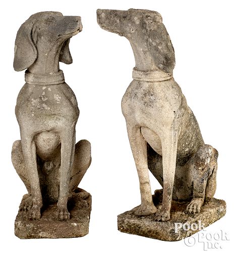 Pair of aggregate garden dog sculptures